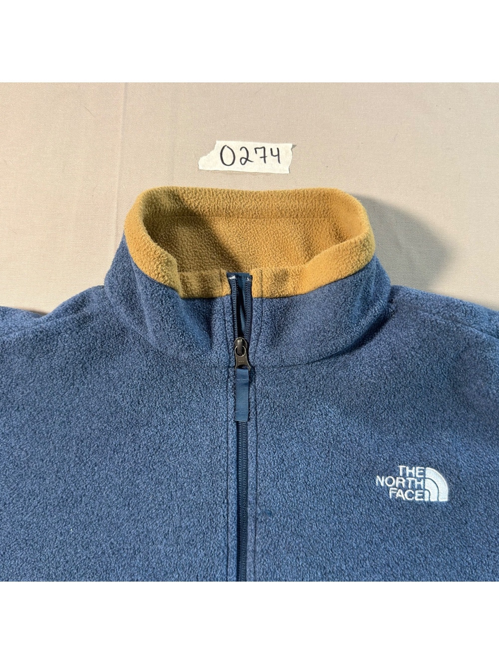 The North Face blue fleece jacket